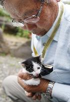 Volcano evacuees reunited with pet cats