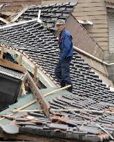 Noto earthquake - Man ponders what to do with damaged house