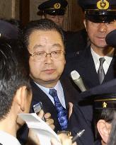 DPJ's Sato quits Diet over money scandal