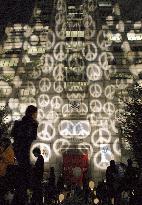 Peace symbols lit up at United Nations University in Tokyo