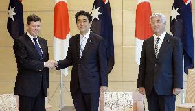 Japan, Australia vow to step up defense cooperation