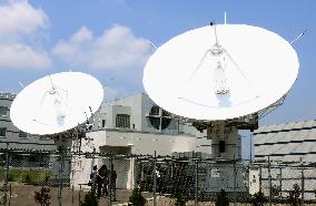 Dishes for weather satellites shown to press
