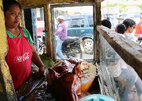 Lechon roast pigs sold in Cotabato, Philippines