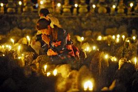 People pray for souls of forlorn dead at Kyoto temple