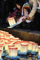 Lantern floating on eve of tsunami anniv.