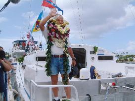 Adventurer Horie leaves Hawaii on wave-propelled boat