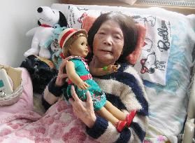 Woman receives doll from Kennedy in return for gift 50 yrs ago