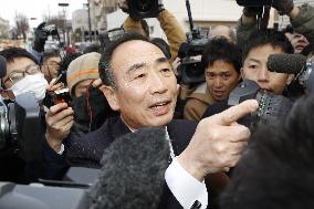 Moritomo Gaken chief Kagoike speaks to reporters