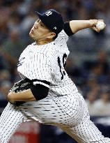 Tanaka keeps Yankees alive in ALDS