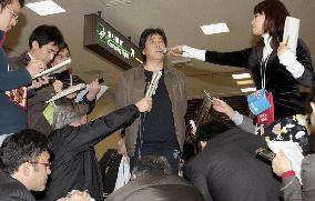 Chinese activist at Narita airport allowed to return home