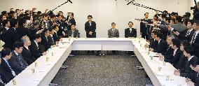 Japan ruling bloc OKs outline of security legislation