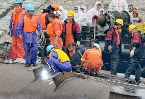 Death toll rising in China ship disaster as survival hopes dim