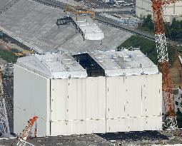 Work begins to dismantle cover at Fukushima plant