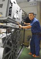 Film projectionist works at theater in central Japan for 5 decades