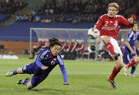 Japan overpower Denmark to cruise into last 16