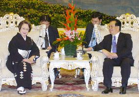 Upper house president visits China