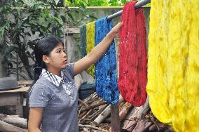Thai local village promotes handcrafted silken fabrics