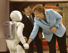 Merkel visits national science museum in Tokyo