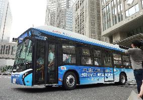 Tokyo Gov. Masuzoe takes trial ride in fuel-cell bus