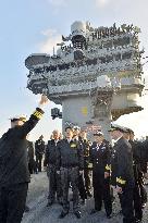 Abe becomes 1st Japan leader to board U.S. aircraft carrier