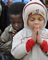 S. African little soccer players pray
