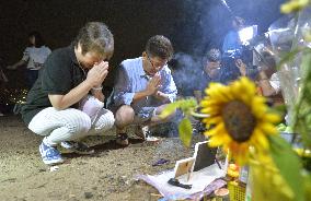 Parents of pregnant landslide victim mourn on anniversary