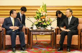 Senior Japan, China officials meet before trilateral summit