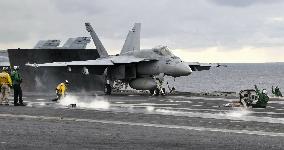 Fighter jet set to take off from U.S. flattop in naval drill