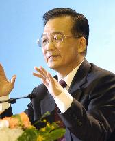 Chinese premier says change in currency may come unexpectedly