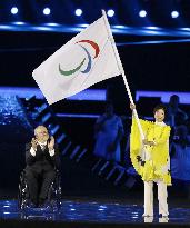 Tokyo Gov. Koike waves Paralympic flag at closing ceremony