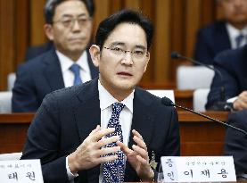 S. Korean tycoons face parliamentary questioning over scandal