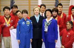 Clinton arrives in Japan on 1st trip abroad to engage Asia