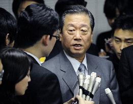 Ozawa says he will stay on despite indictment of aides