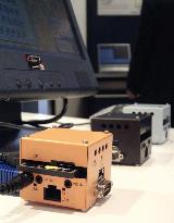 Pocket-sized computer debuts at Tokyo trade show