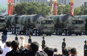 Beijing shows off new weaponry in 60th anniversary parade