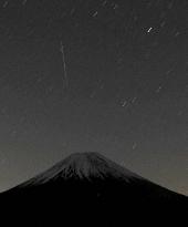 Geminid meteor shower over Mt. Fuji