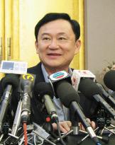 Ousted Thai premier Thaksin hopes to return home by April