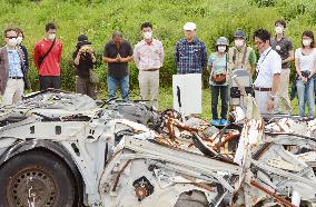 Residents of quake-hit town hold tour