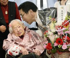 Japanese woman receives early 117th birthday present