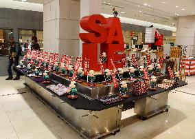Osaka department store sells leftover stock on sushi conveyor belt