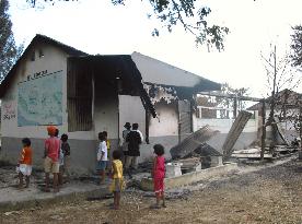 Rebels accused of burning schools, martial law in Aceh slammed