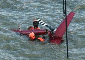 Missing chopper crashed, coast guard says after finding debris