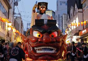 Float of 'hell king' drawn at spa resort festival