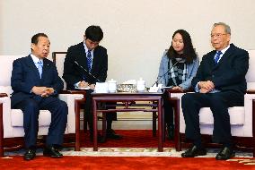 Senior Japanese lawmaker Nikai meets China's ex-vice premier