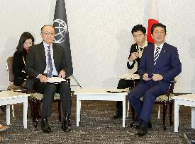 World Bank chief Kim meets Japanese PM Abe