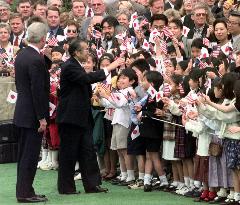 Obuchi receives welcoming ceremony in Washington