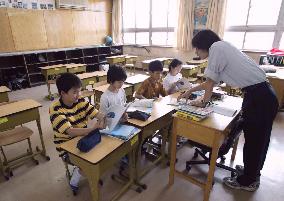 (3)Japanese school in Beijing reopened after SARS break