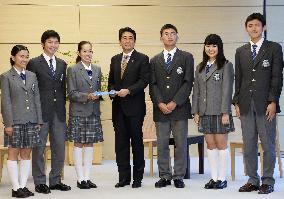 PM Abe meets J7 Summit team Japan