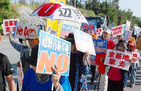 People protest as minister invalidates Okinawa decision