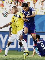 Japan crash out of World Cup after 4-1 hammering by Colombia